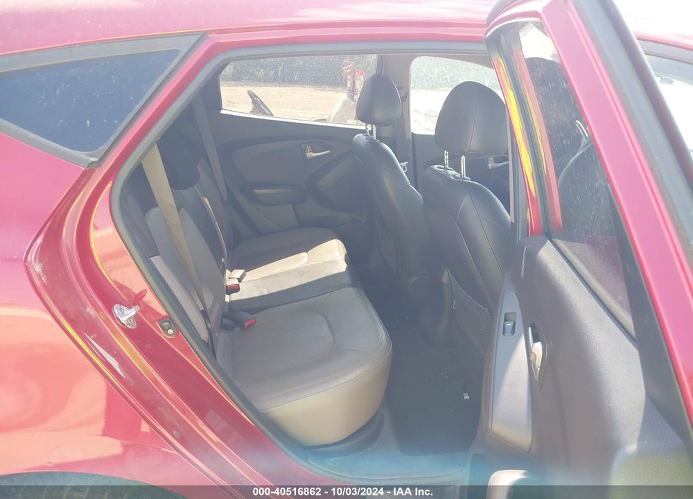 2012 HYUNDAI TUCSON LIMITED VIN: KM8JUCAC4CU404303