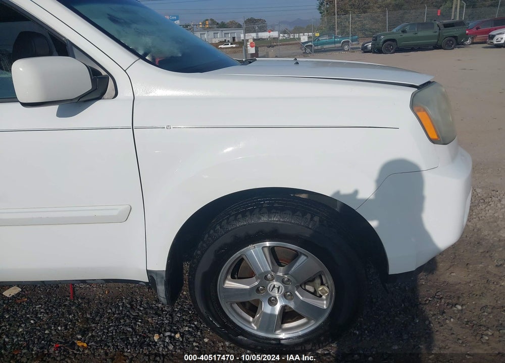 2011 HONDA PILOT EX-L VIN: 5FNYF3H51BB010107