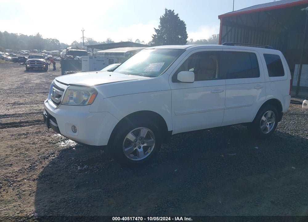 2011 HONDA PILOT EX-L VIN: 5FNYF3H51BB010107
