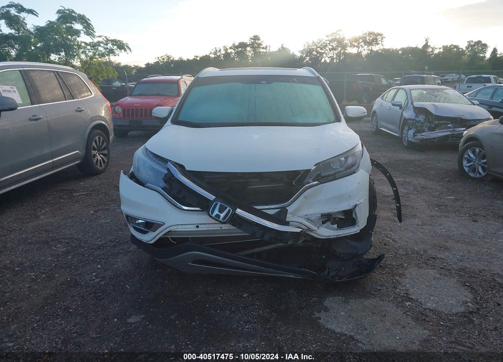 2016 HONDA CR-V TOURING VIN: 5J6RM3H98GL028924
