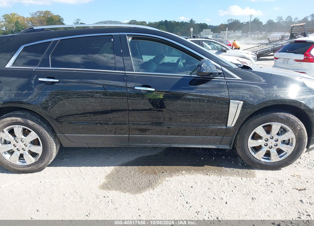 2016 CADILLAC SRX LUXURY COLLECTION VIN: 3GYFNBE3XGS572331