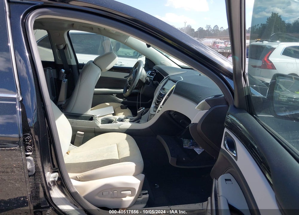 2016 CADILLAC SRX LUXURY COLLECTION VIN: 3GYFNBE3XGS572331