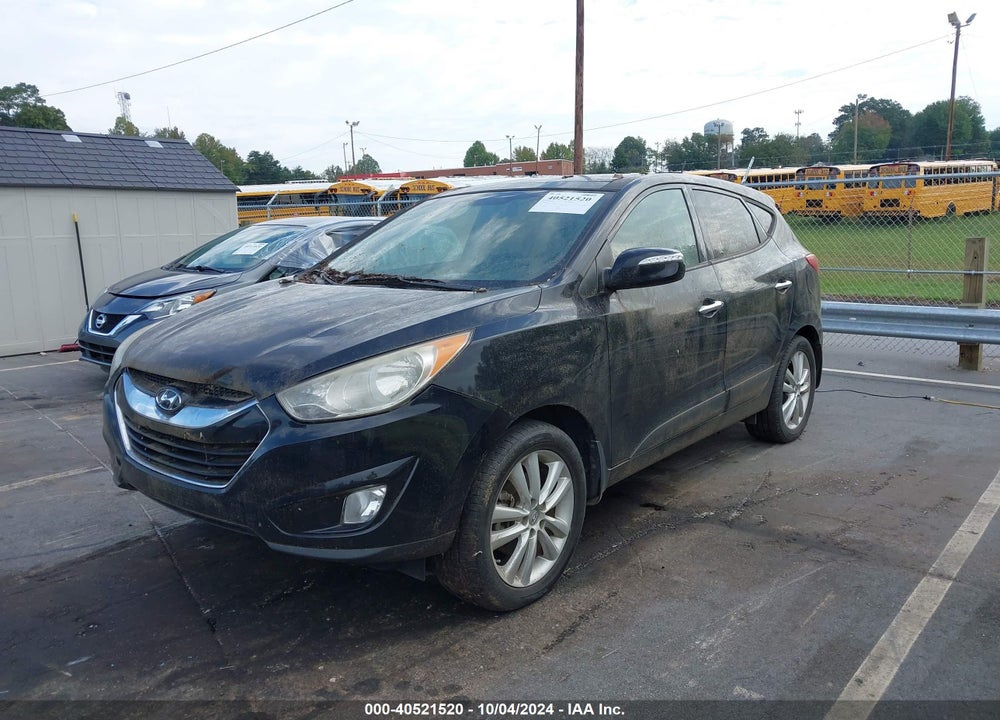 2012 HYUNDAI TUCSON LIMITED VIN: KM8JUCAC1CU537438