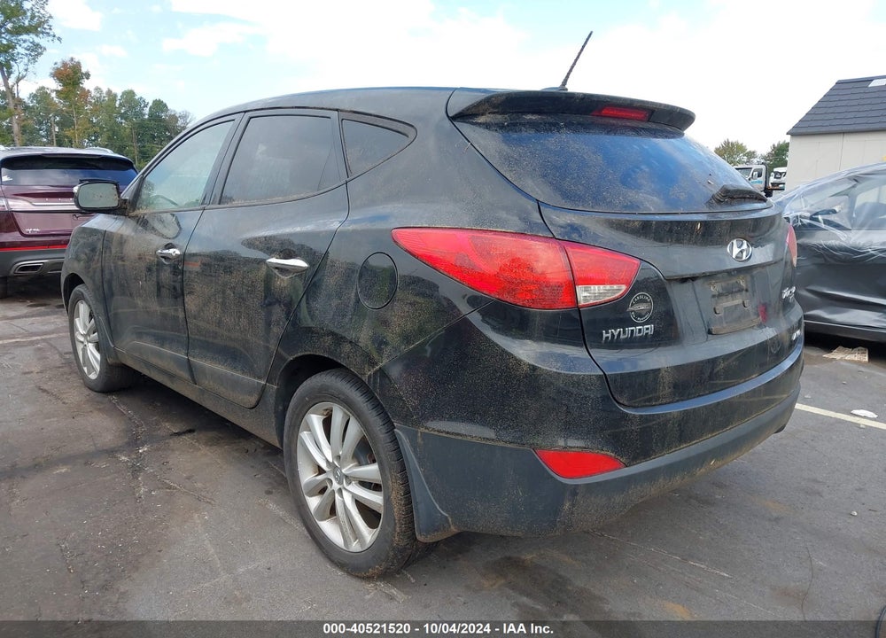 2012 HYUNDAI TUCSON LIMITED VIN: KM8JUCAC1CU537438