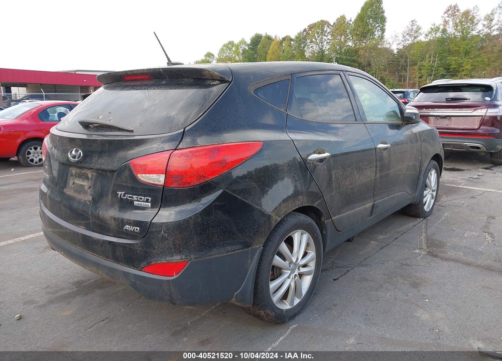 2012 HYUNDAI TUCSON LIMITED VIN: KM8JUCAC1CU537438