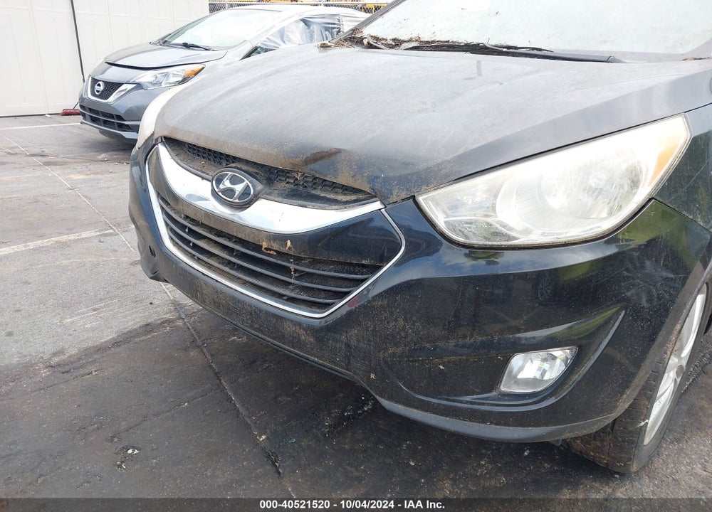 2012 HYUNDAI TUCSON LIMITED VIN: KM8JUCAC1CU537438