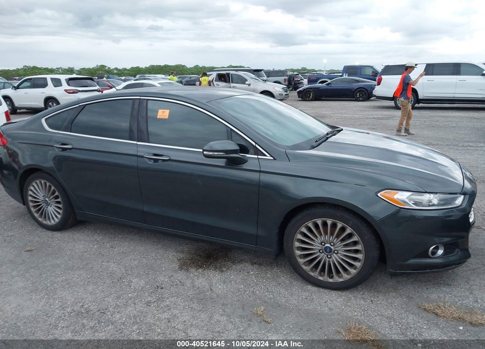2016 FORD FUSION TITANIUM VIN: 3FA6P0K99GR188051