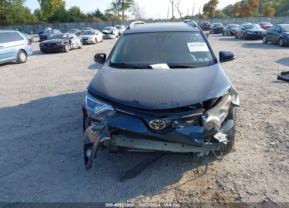 2018 TOYOTA RAV4 XLE VIN: JTMRFREV9JJ736042