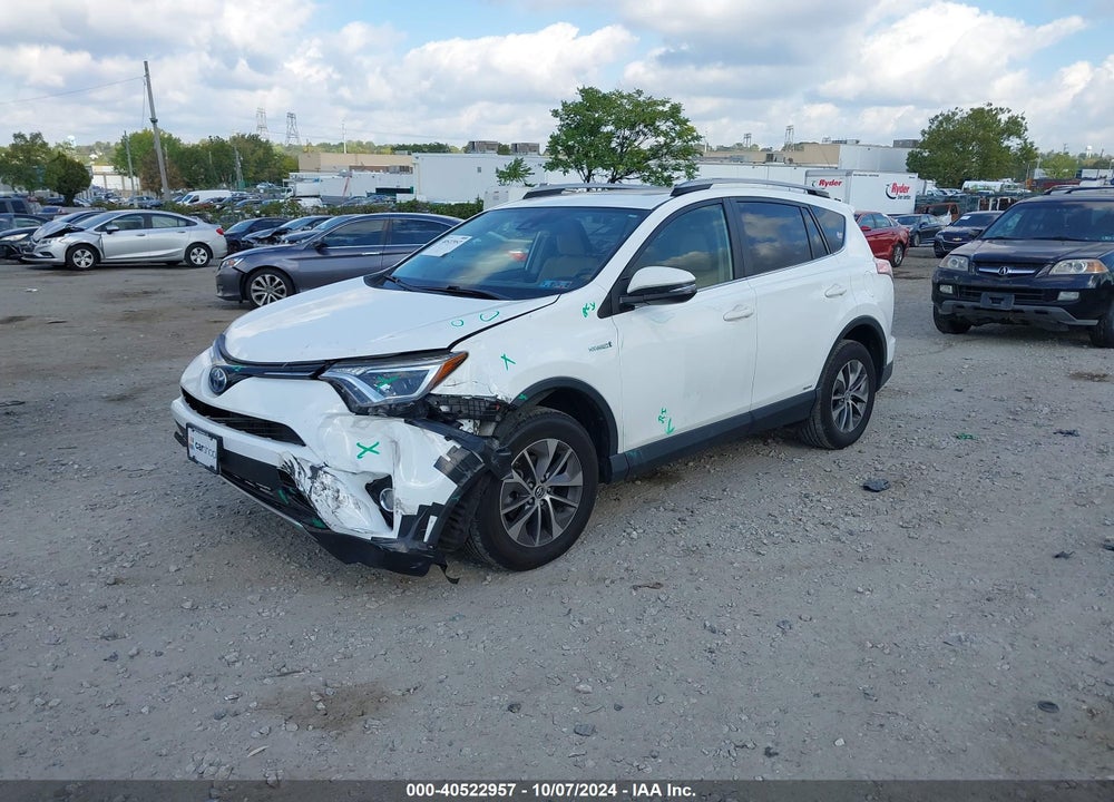 2018 TOYOTA RAV4 HYBRID XLE VIN: JTMRJREV3JD173549