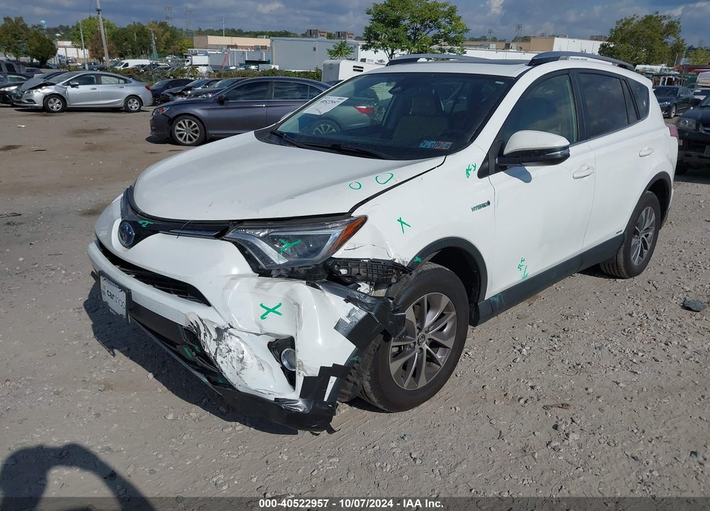 2018 TOYOTA RAV4 HYBRID XLE VIN: JTMRJREV3JD173549