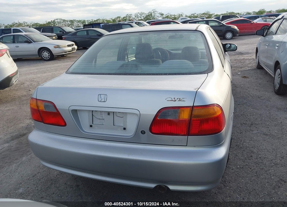 1999 HONDA CIVIC LX VIN: 2HGEJ6679XH568216