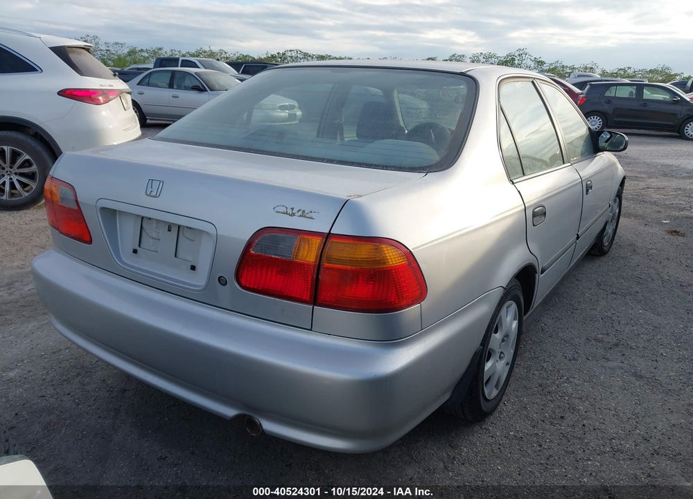 1999 HONDA CIVIC LX VIN: 2HGEJ6679XH568216