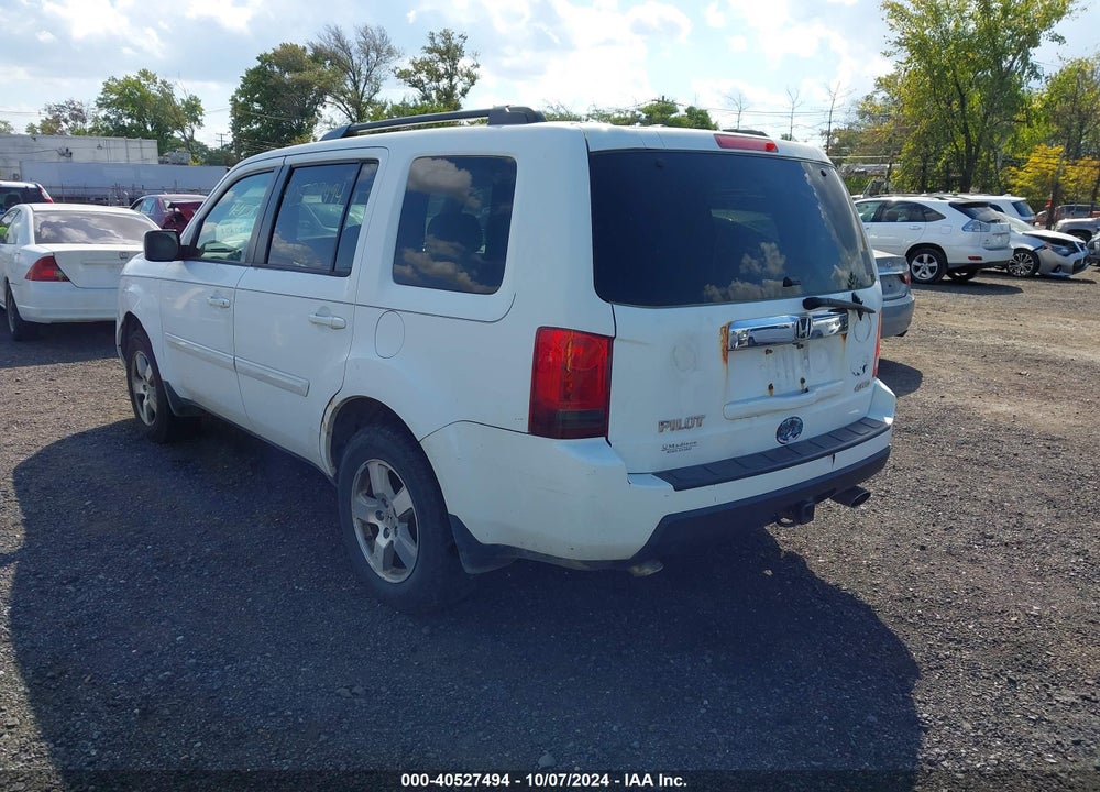 2011 HONDA PILOT EX-L VIN: 5FNYF4H58BB050495