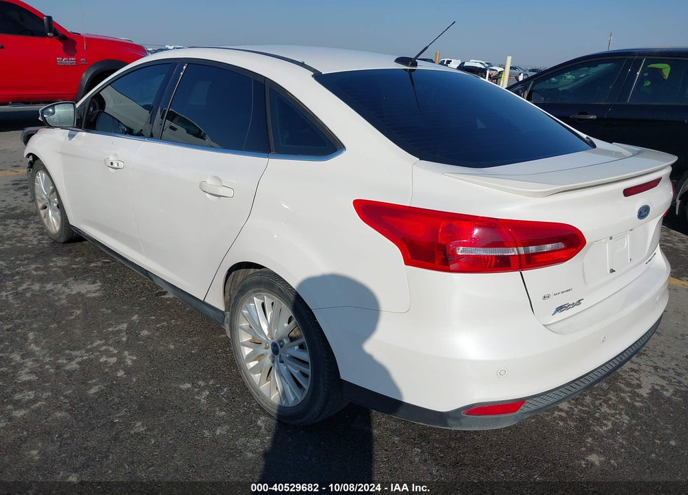 2017 FORD FOCUS TITANIUM VIN: 1FADP3J27HL212800