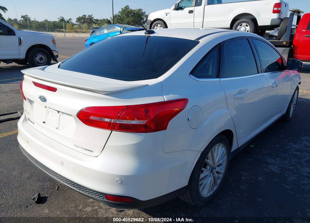 2017 FORD FOCUS TITANIUM VIN: 1FADP3J27HL212800