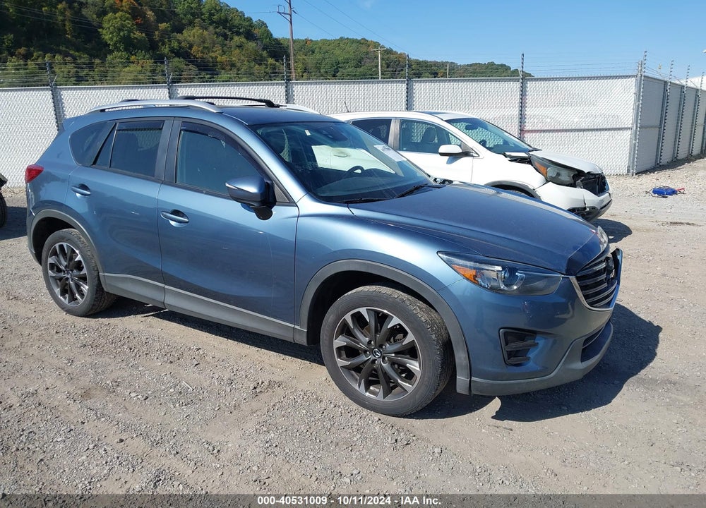 2016 MAZDA CX-5 GRAND TOURING VIN: JM3KE4DY2G0640729