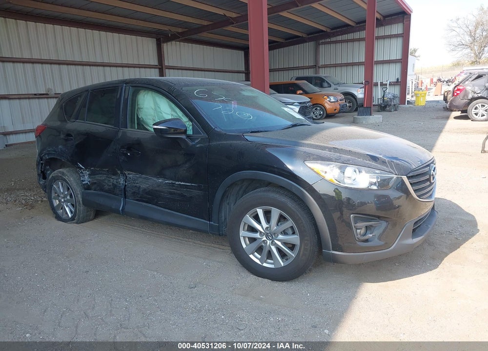2016 MAZDA CX-5 TOURING VIN: JM3KE2CY4G0633450
