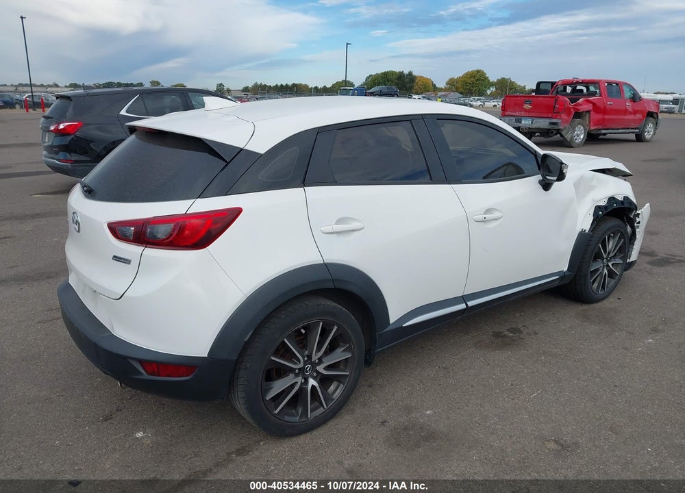 2016 MAZDA CX-3 GRAND TOURING VIN: JM1DKBD75G0110115