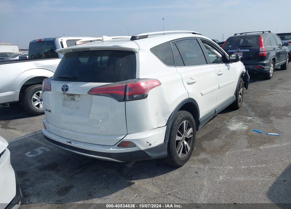2016 TOYOTA RAV4 XLE VIN: JTMWFREV8GJ083554