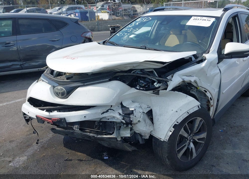 2016 TOYOTA RAV4 XLE VIN: JTMWFREV8GJ083554