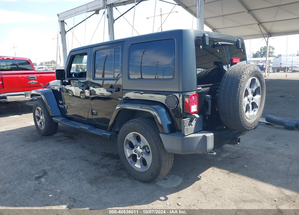 2016 JEEP WRANGLER UNLIMITED SAHARA VIN: 1C4BJWEG3GL135402