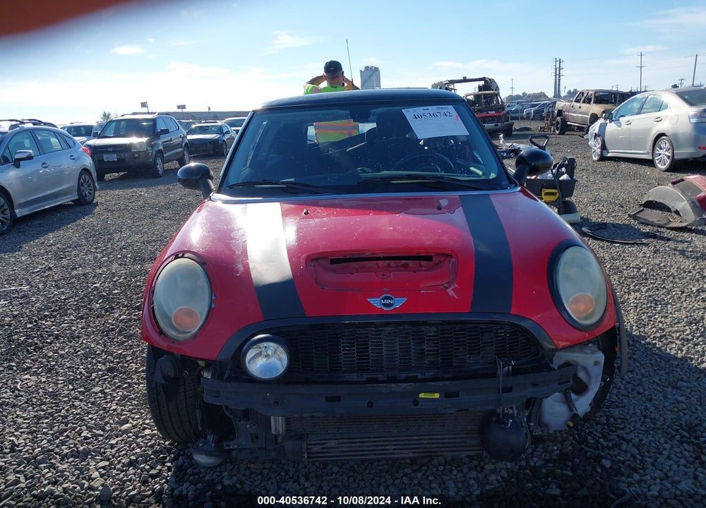 2009 MINI COOPER S VIN: WMWMF73549TW81207