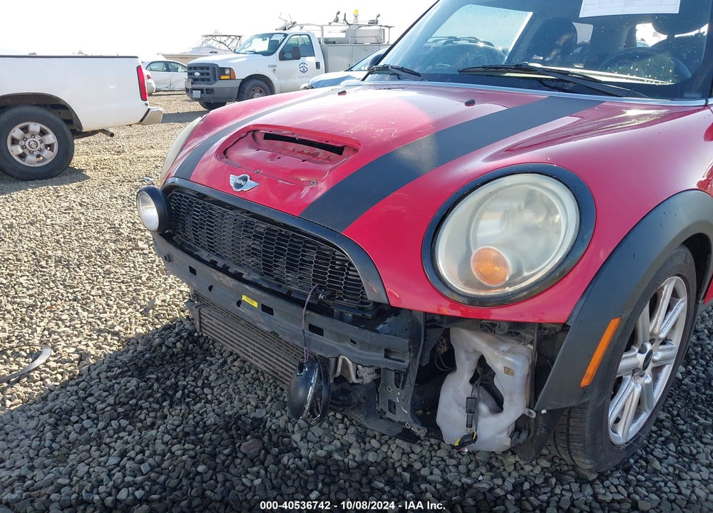 2009 MINI COOPER S VIN: WMWMF73549TW81207