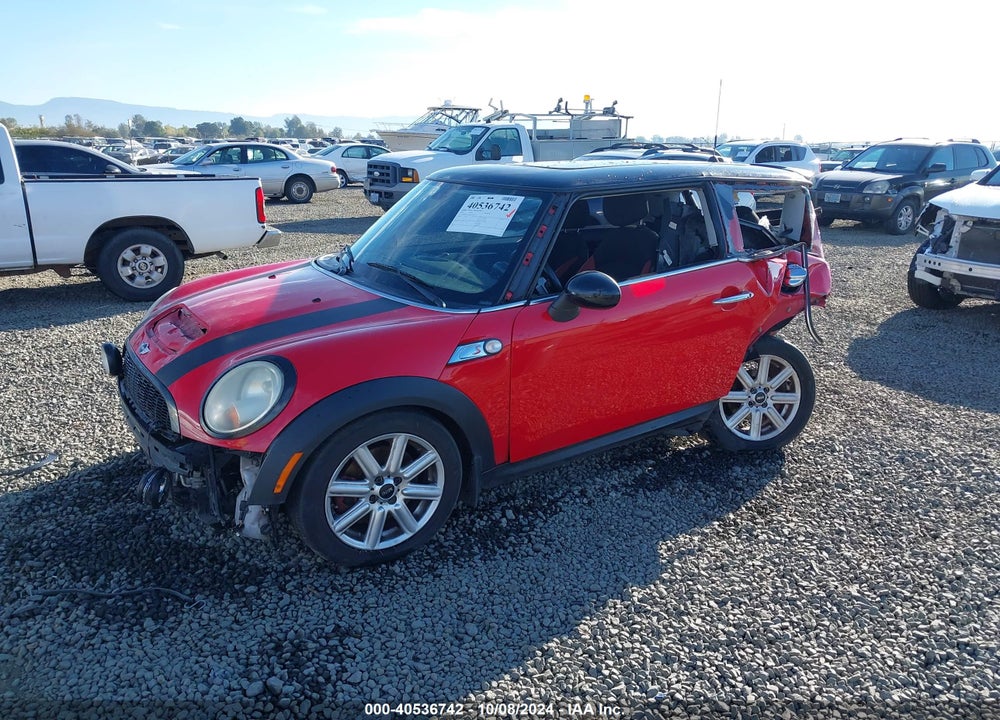 2009 MINI COOPER S VIN: WMWMF73549TW81207