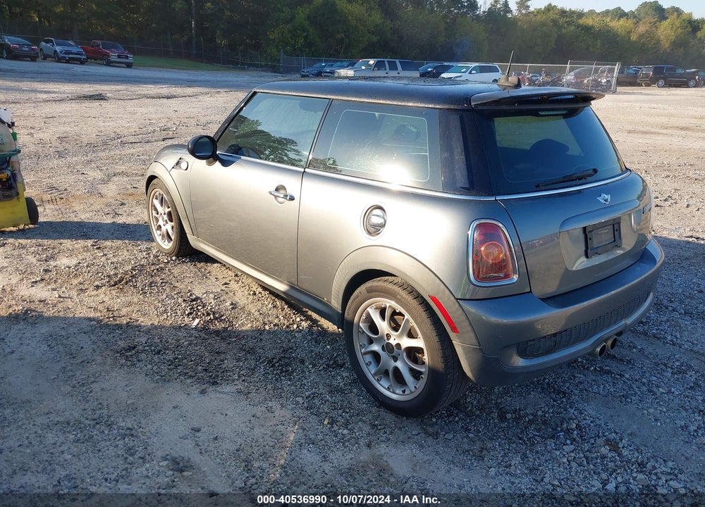 2009 MINI COOPER S VIN: WMWMF73559TW84780