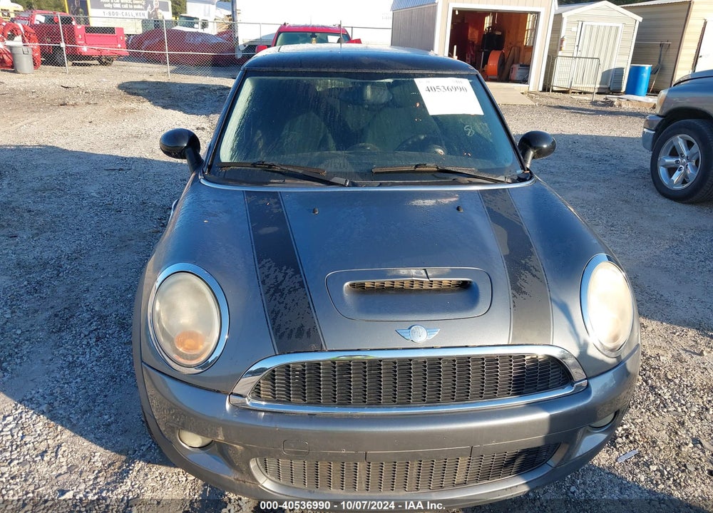 2009 MINI COOPER S VIN: WMWMF73559TW84780