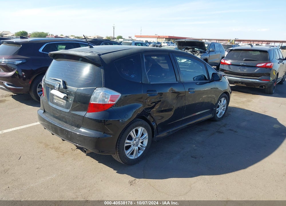 2009 HONDA FIT SPORT VIN: JHMGE884X9S022979