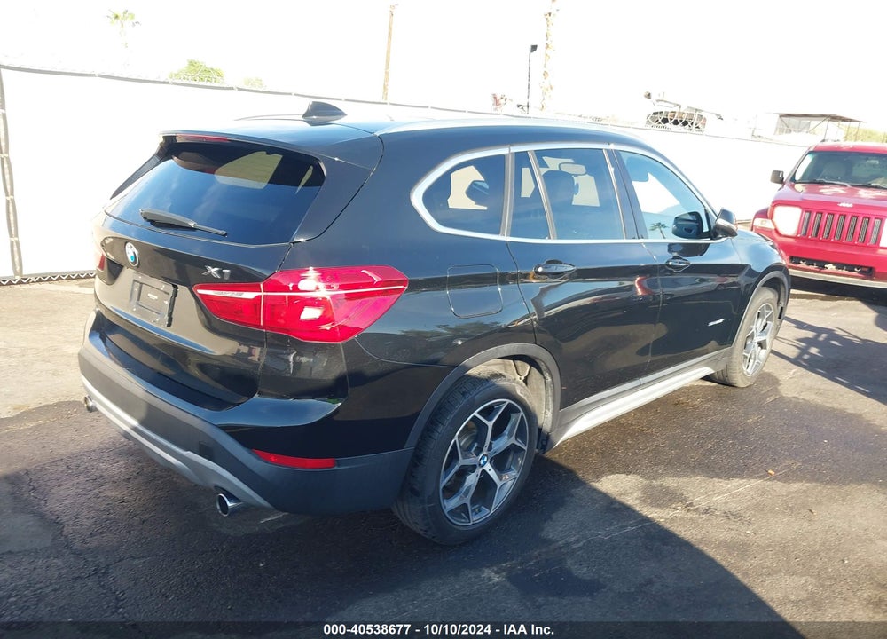 2018 BMW X1 VIN: WBXHU7C35J5H40661