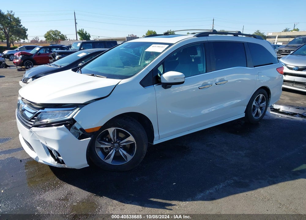 2018 HONDA ODYSSEY TOURING VIN: 5FNRL6H85JB011669