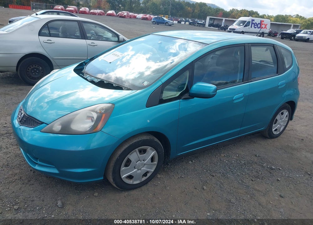 2013 HONDA FIT VIN: JHMGE8H30DC048257