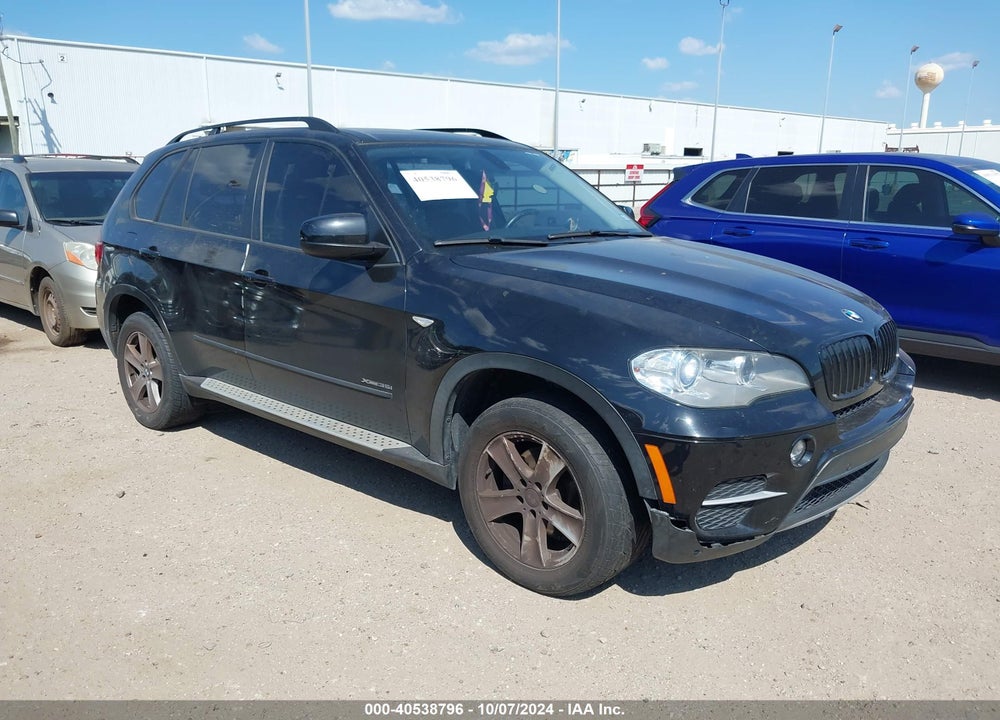 2012 BMW X5 XDRIVE35I/XDRIVE35I PREMIUM/XDRIVE35I SPORT ACTIVITY VIN: 5UXZV4C50CL990107