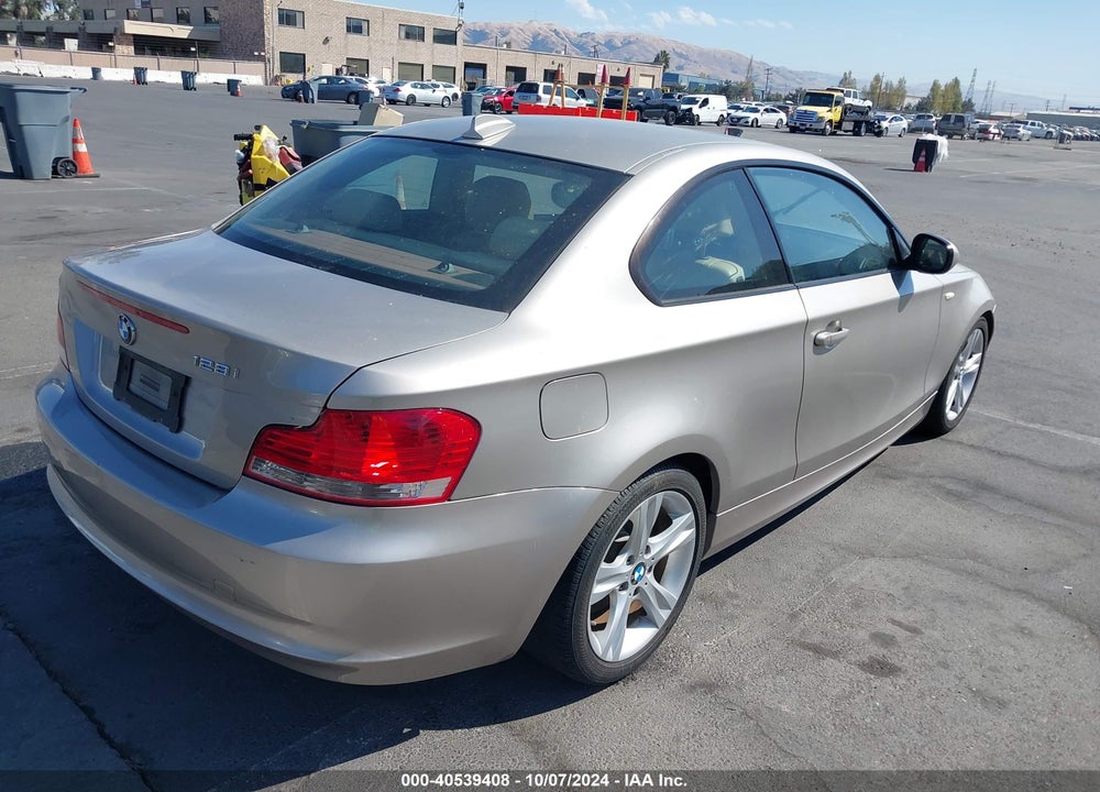 2011 BMW 128I VIN: WBAUP9C55BVL90881