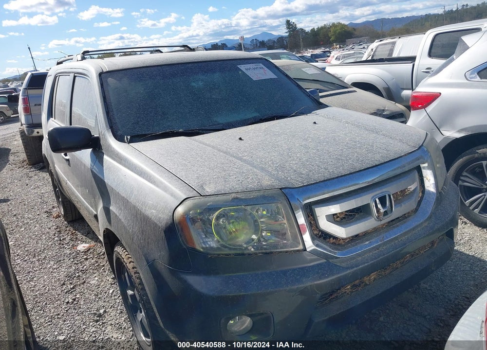 2011 HONDA PILOT EX-L VIN: 5FNYF4H59BB016095