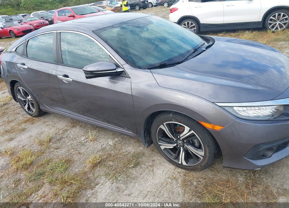 2016 HONDA CIVIC TOURING VIN: 19XFC1F94GE018385