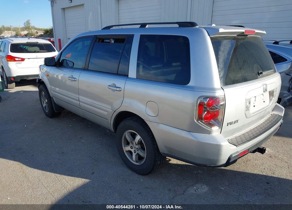 2007 HONDA PILOT EX-L VIN: 5FNYF18597B011694