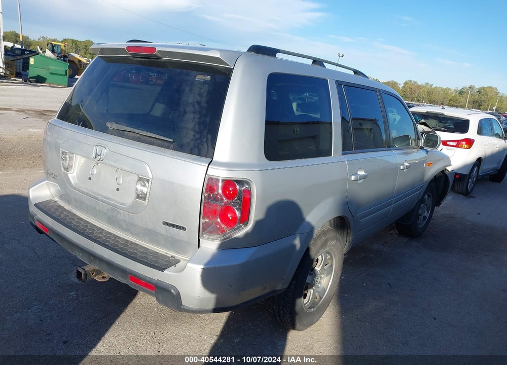2007 HONDA PILOT EX-L VIN: 5FNYF18597B011694