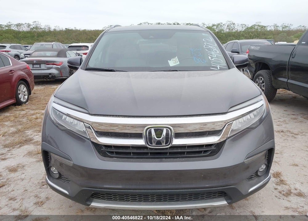 2021 HONDA PILOT 2WD TOURING 8 PASSENGER VIN: 5FNYF5H93MB006724