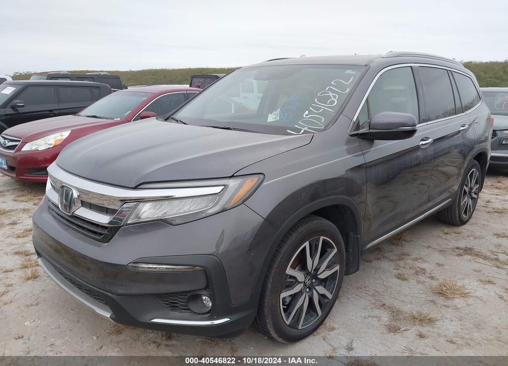 2021 HONDA PILOT 2WD TOURING 8 PASSENGER VIN: 5FNYF5H93MB006724