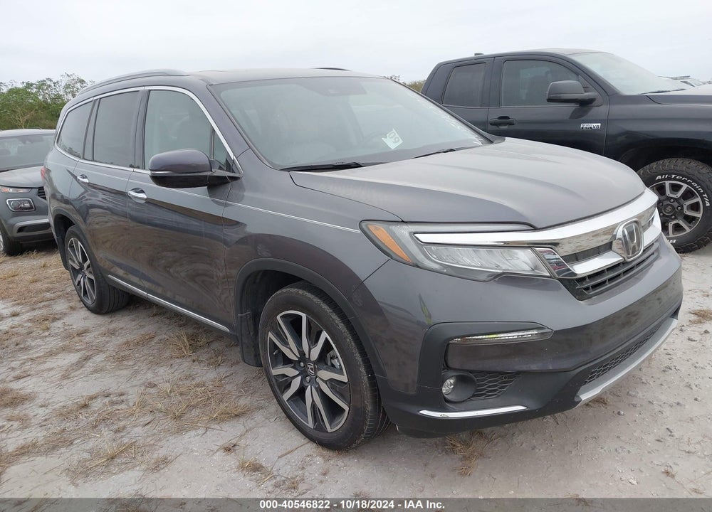 2021 HONDA PILOT 2WD TOURING 8 PASSENGER VIN: 5FNYF5H93MB006724