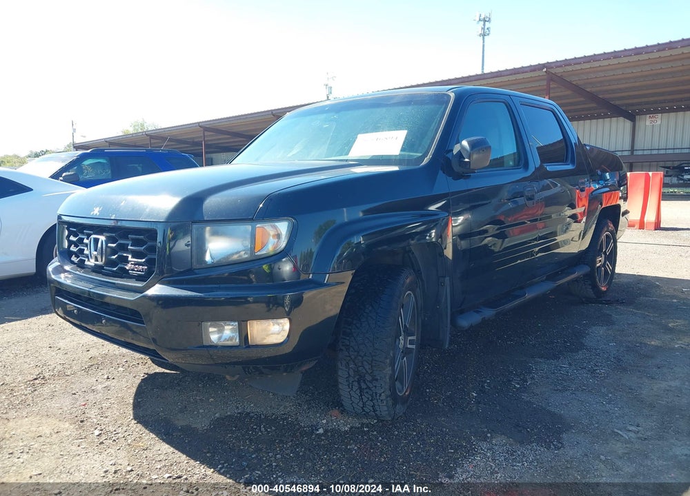 2012 HONDA RIDGELINE SPORT VIN: 5FPYK1F77CB002025
