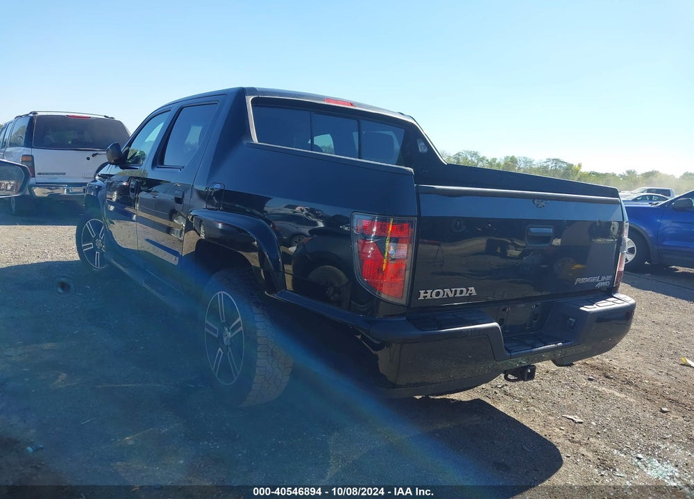 2012 HONDA RIDGELINE SPORT VIN: 5FPYK1F77CB002025