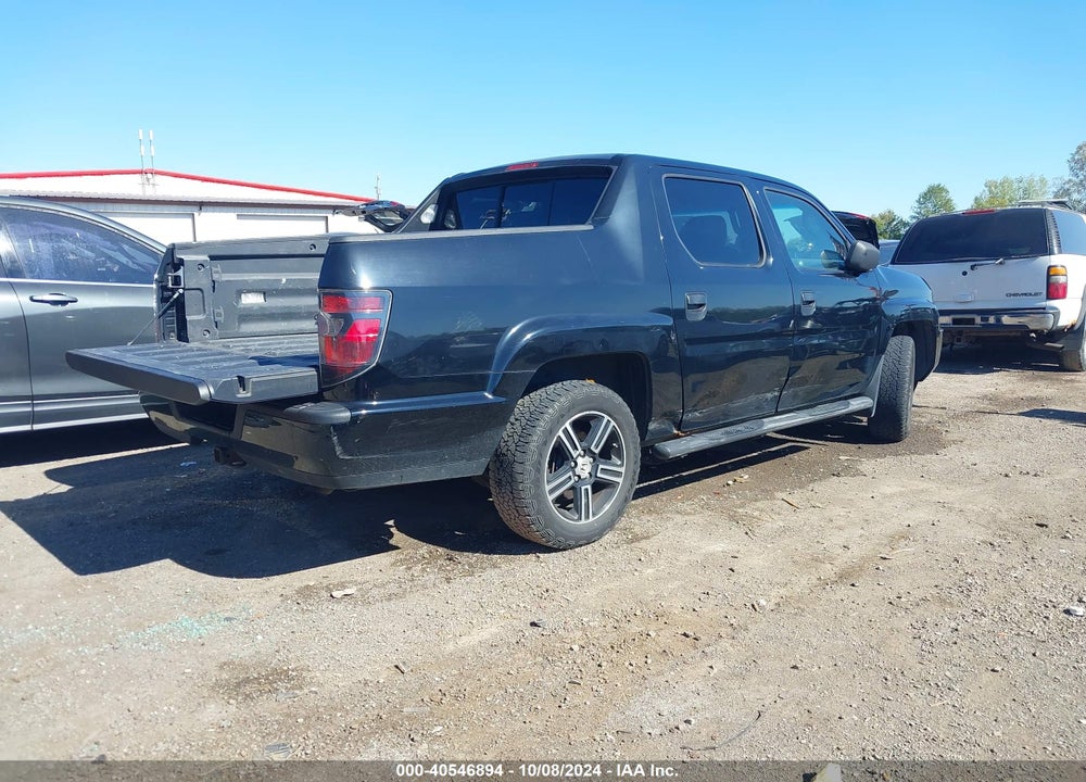 2012 HONDA RIDGELINE SPORT VIN: 5FPYK1F77CB002025