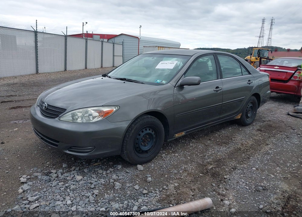 2003 TOYOTA CAMRY LE VIN: JTDBE32K930233955