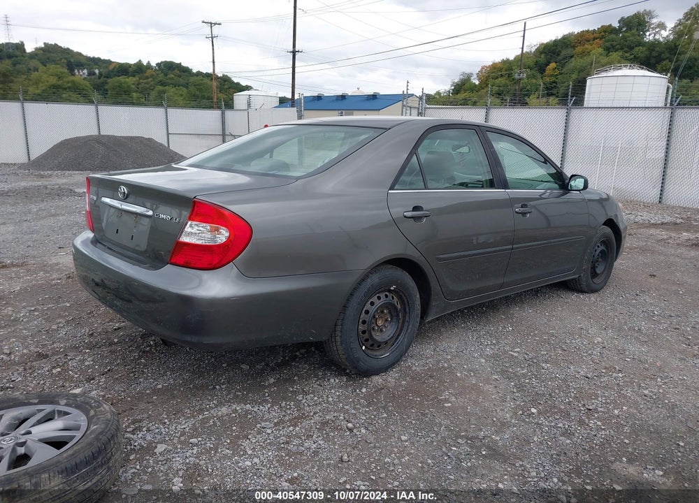 2003 TOYOTA CAMRY LE VIN: JTDBE32K930233955