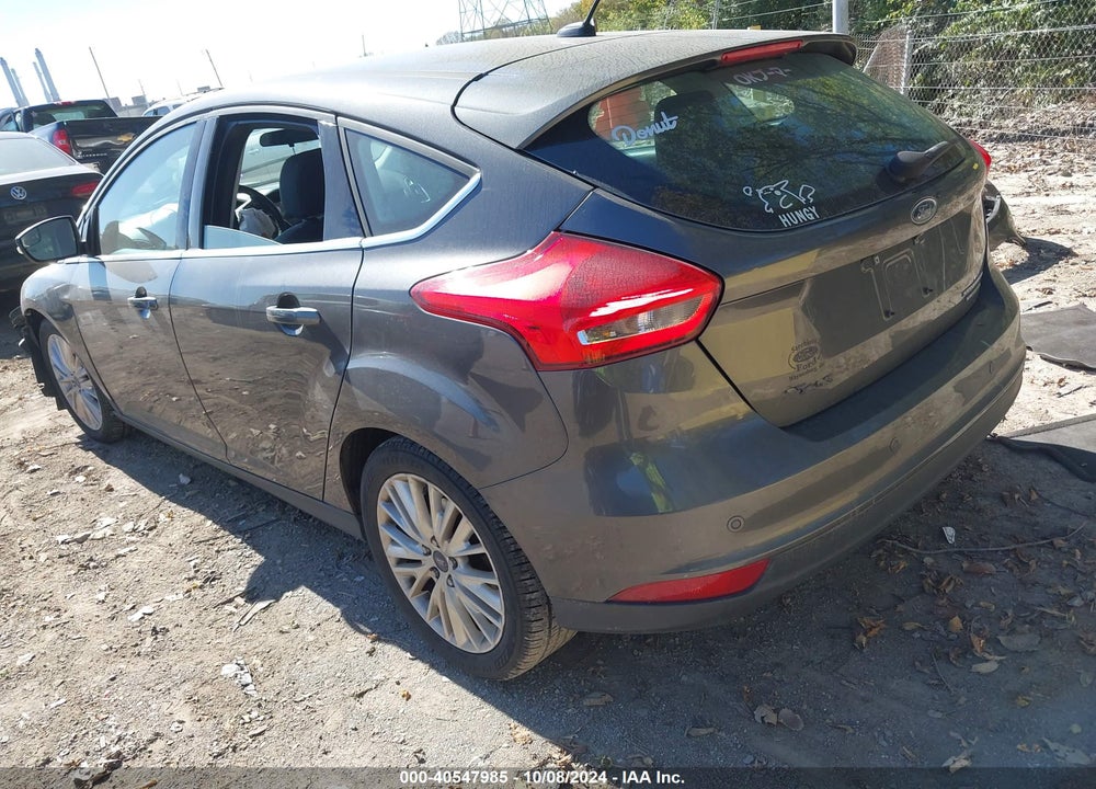 2016 FORD FOCUS TITANIUM VIN: 1FADP3N27GL262038