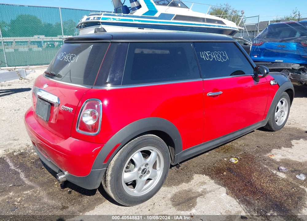 2011 MINI COOPER VIN: WMWSU3C53BT183947
